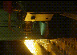 Animated GIF of a laser making a fine cut.